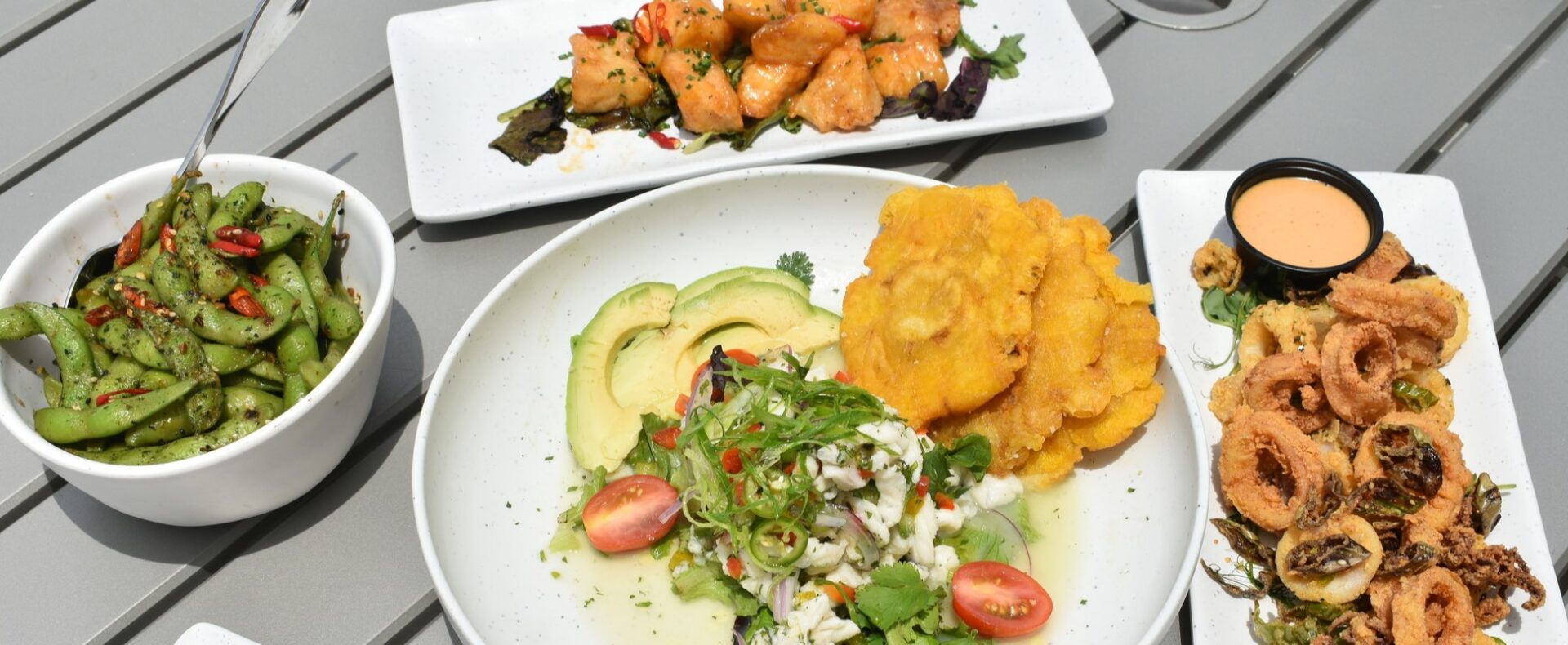 Watersound Club dining venue Beach Break Grill - ceviche, edamame, grouper bites, and calamari