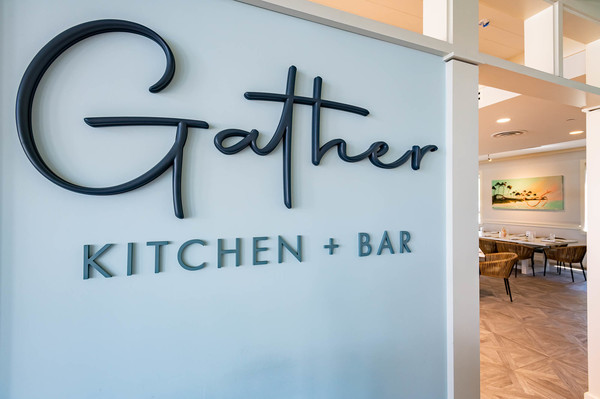Photo of the entry sign at Gather Kitchen + Bar located at the WaterColor Inn