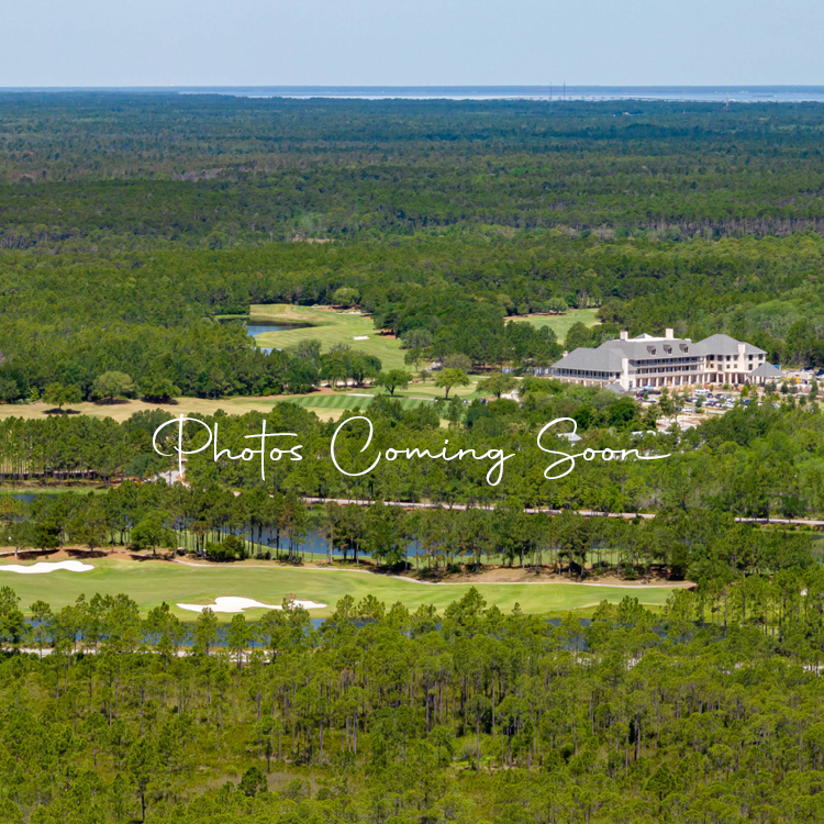 "Photos coming soon" placeholder image of an aerial view of Camp Creek Inn and the golf course