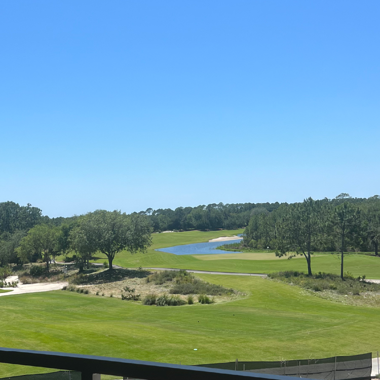 View of Camp Creek Golf Course from a guest room balcony at Camp Creek Inn.