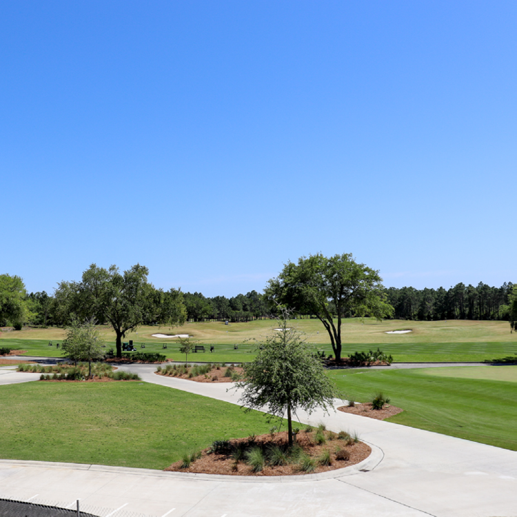 A view of the practice facility at Camp Creek Golf Course from a guest room balcony at Camp Creek Inn.